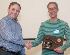 At the start of the meeting, founding (and returning) president, Dick Gingras (left) presented a distinguished service award to outgoing president, Richard Corzo, for his four years of inspired leadership.
